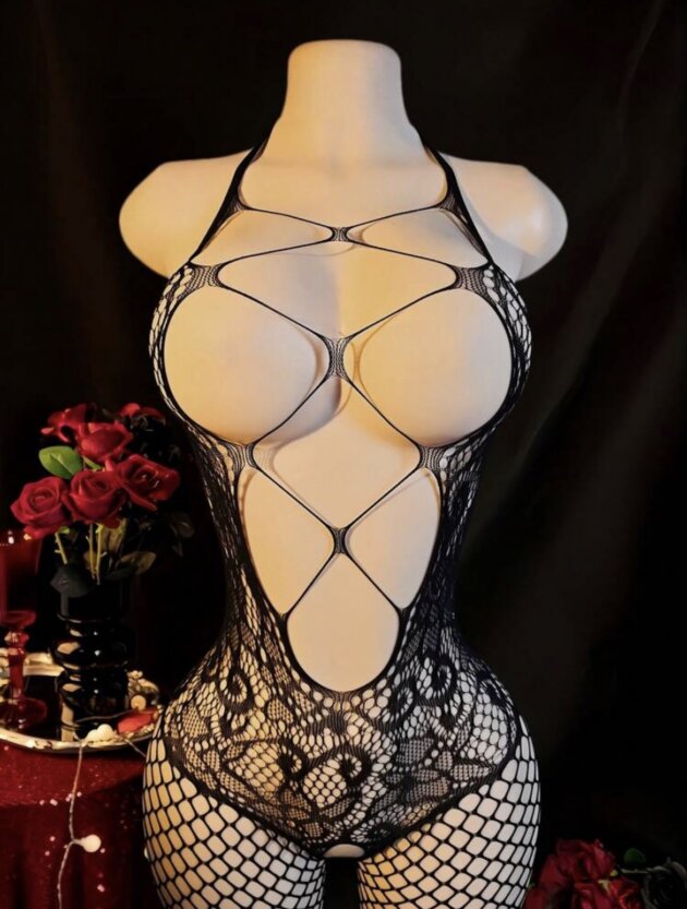 Vlora Intimate jacquard lingerie bodysuit features a hollow-out fishnet design and adjustable spaghetti straps Fits L-XL.